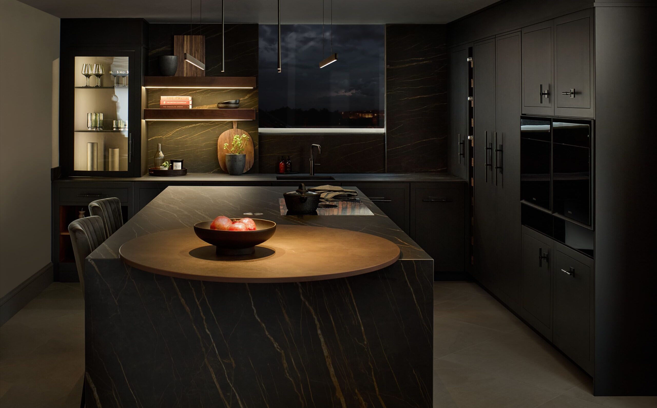 Black modern kitchen design with mood lighting and accent lighting