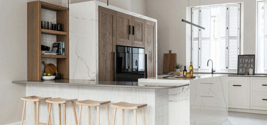 Luxury bespoke kitchen incorporating 2026 kitchen trends with open plan white design and natural wood features