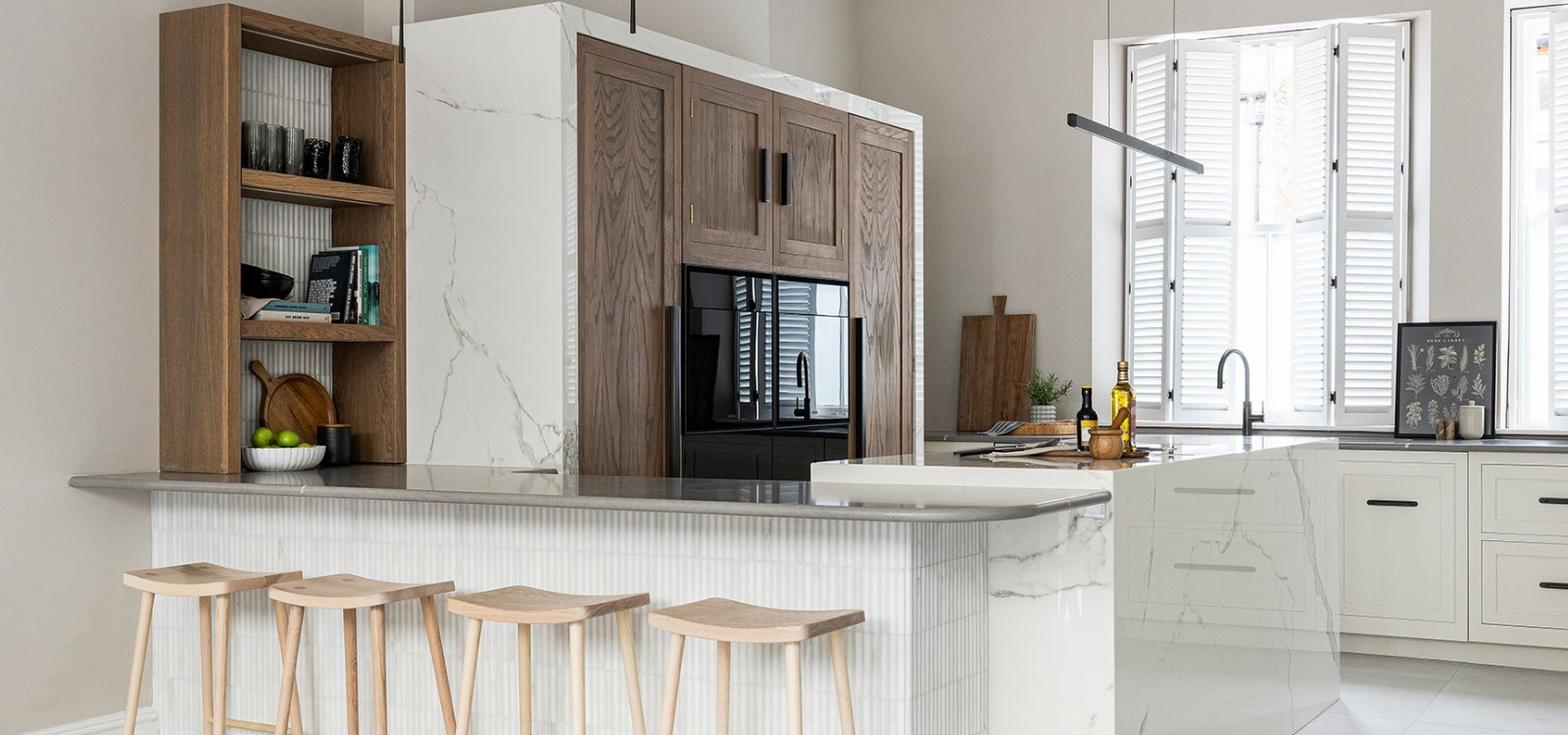 Luxury bespoke kitchen incorporating 2026 kitchen trends with open plan white design and natural wood features