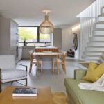 Open plan living area, dining area and Linear Edge kitchen design with a natural colour scheme