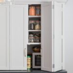 White Arbor kitchen cabinetry featuring organised storage