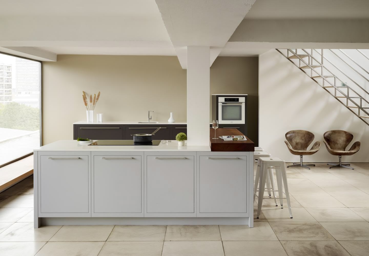 Linear kitchen featuring low level design and white kitchen cabinetry