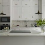 White Original kitchen cabinetry with white marble worktops