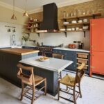 Original kitchen design with copper accents and dining area
