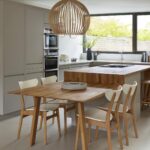 Open plan kitchen dining area and linear edge kitchen design in natural colours