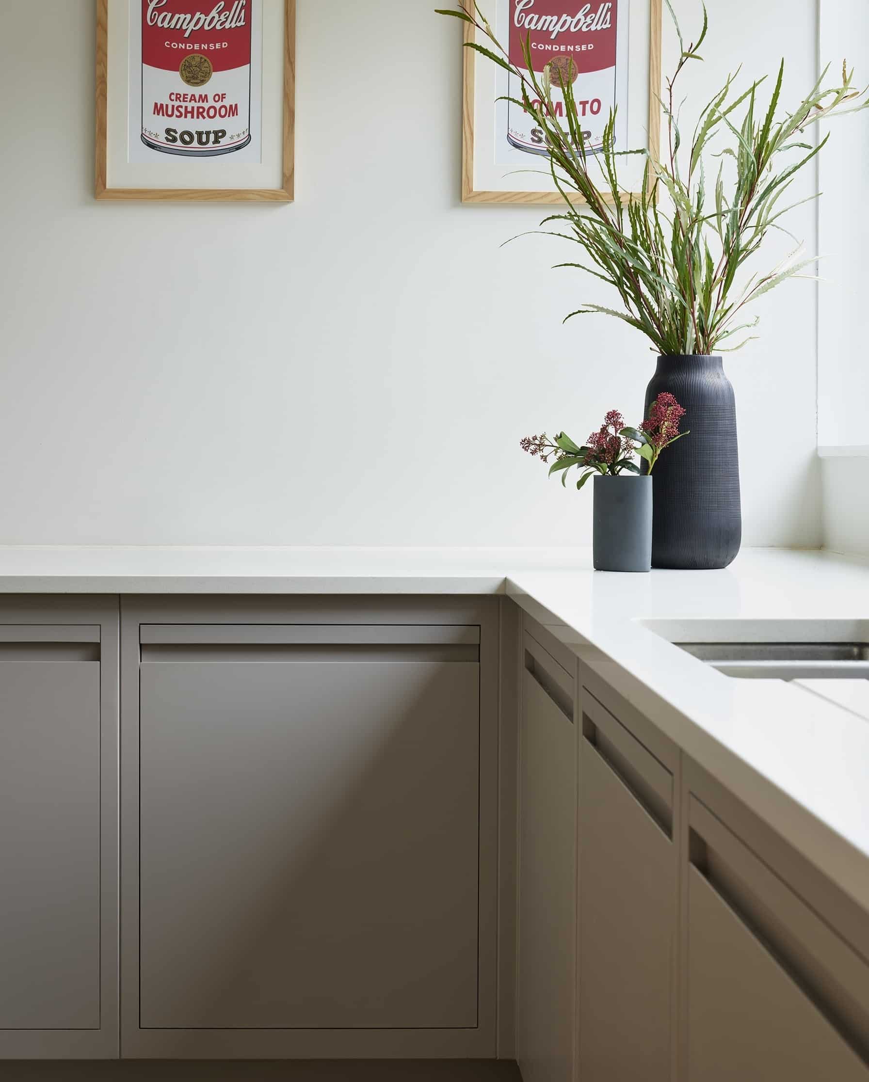 Beige Linear Edge kitchen cabinetry with white worktop