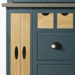 Close up of rich blue and natural wood kitchen draws