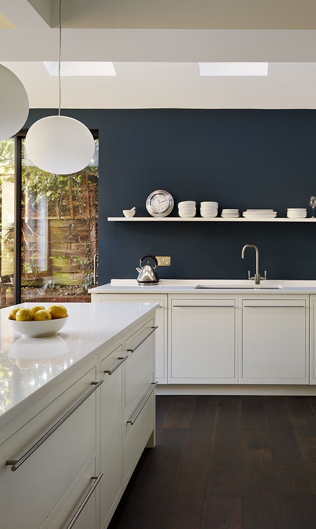 Chic kitchen featuring low level cupboards