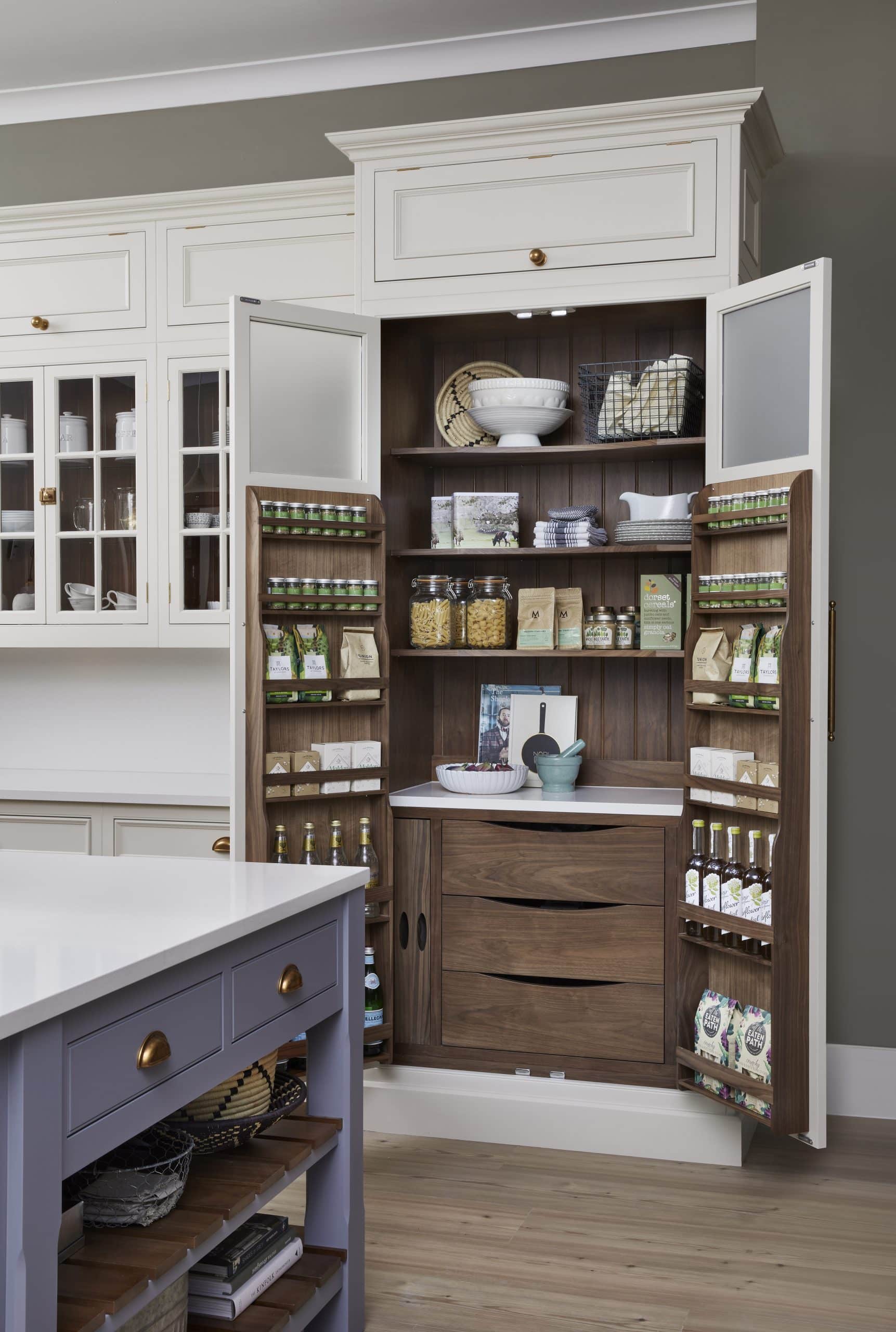 Harvey Jones Original kitchen pantry larder open to show organised storage