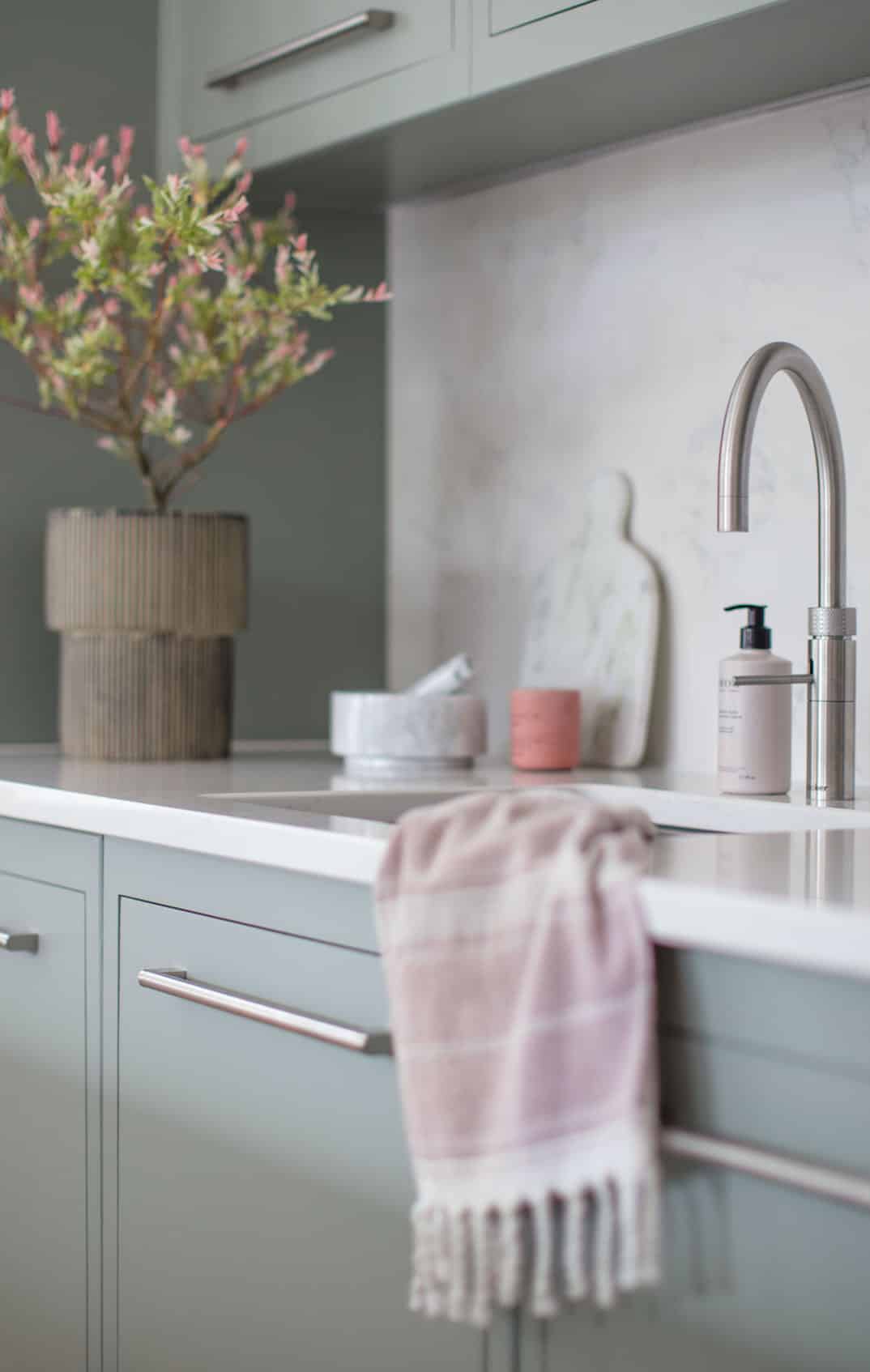 green grey Linear kitchen cabinetry with white worktop