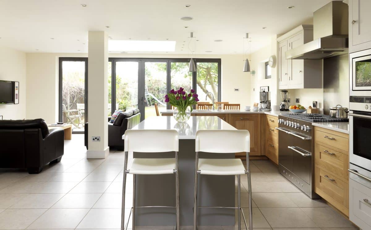 Open plan oak and painted Shaker kitchen design