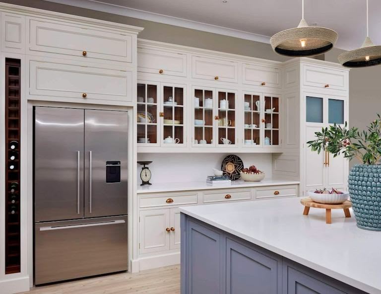 White kitchen cabinetry with organised storage