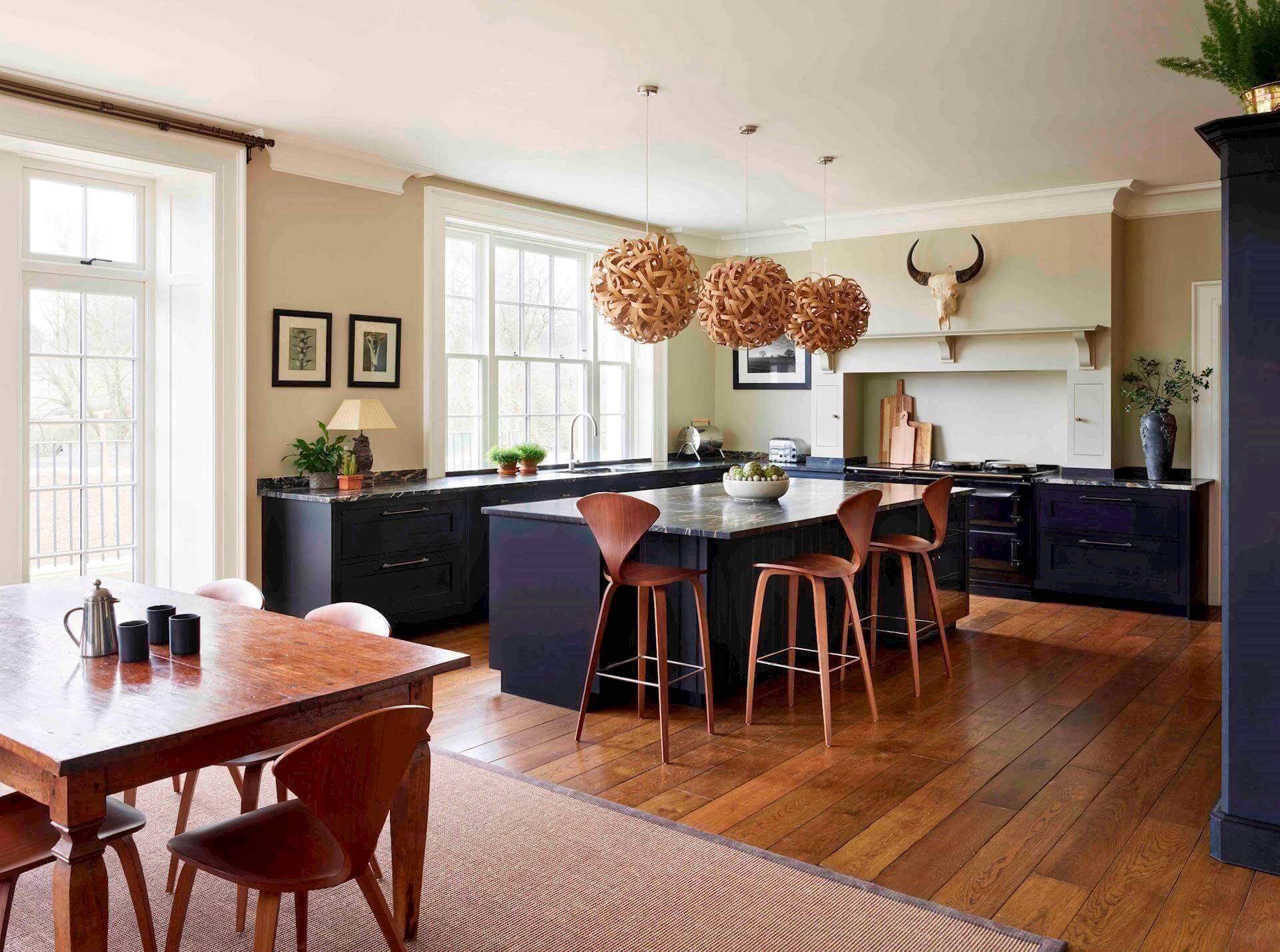 Shaker kitchen featuring wooden floors
