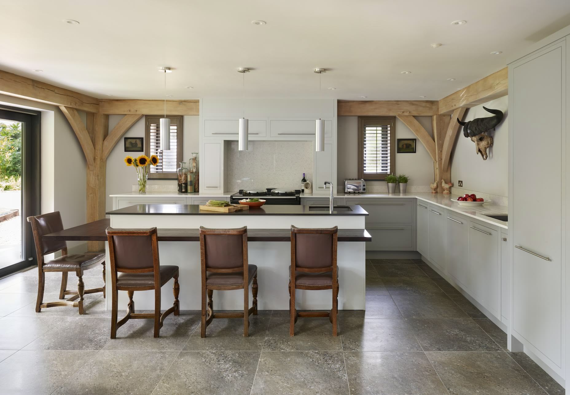 Kitchen island featuring integrated seating