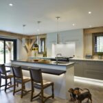 Kitchen island featuring integrated seating