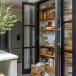 Open dark Arbor kitchen pantry with organised storage