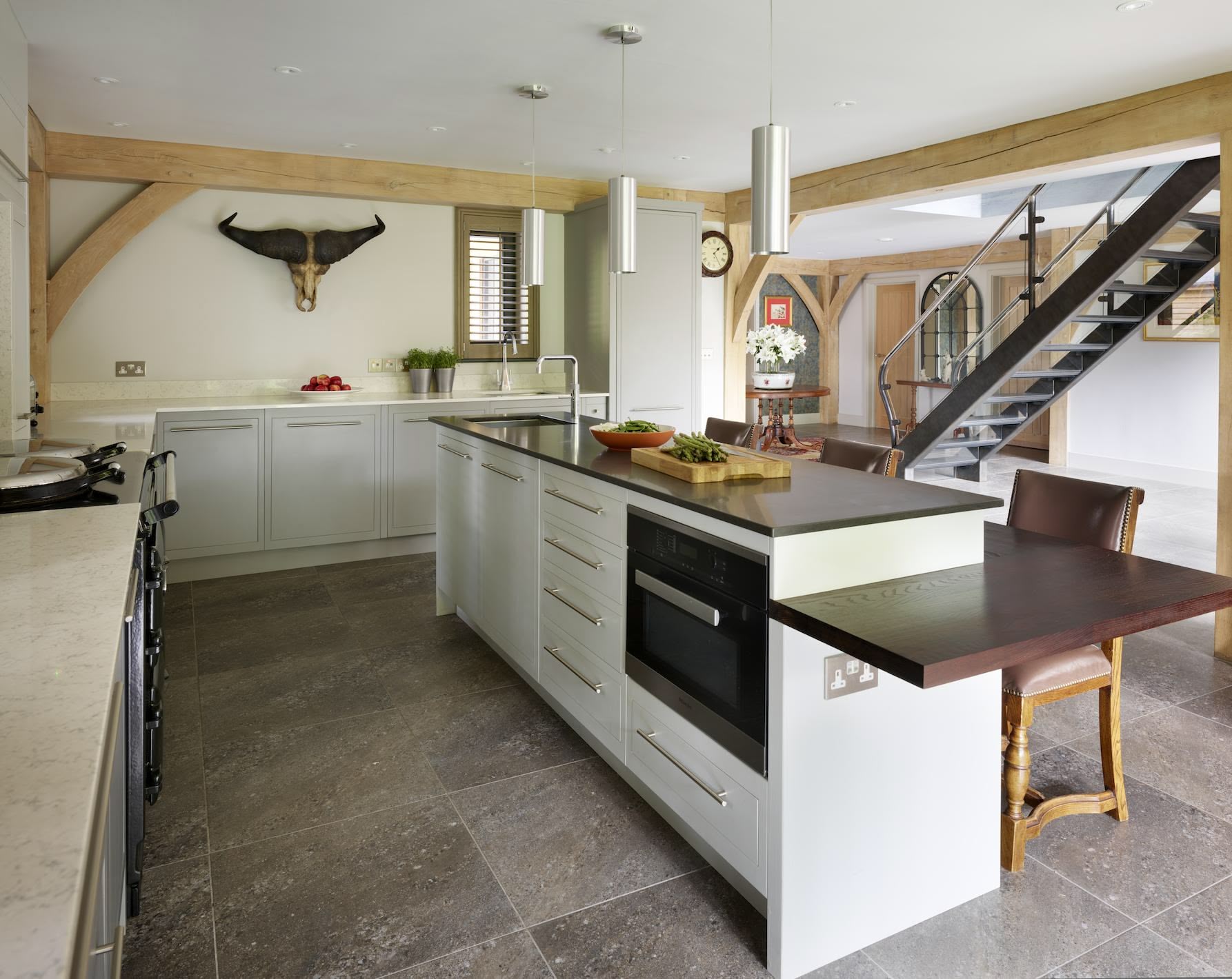Kitchen island featuring integrated seating