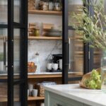 Dark Arbor kitchen pantry open to show organised storage