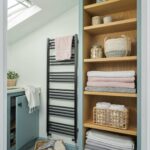Bathroom Arbor shelving unit and grey cabinetry