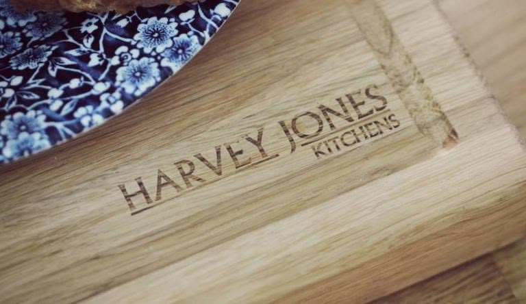 Closeup of Harvey Jones logo on an oak chopping board