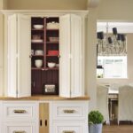 Harvey Jones white kitchen dresser open to show organised shelving