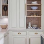 Harvey Jones white kitchen dresser open to show organised shelving