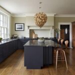 Black shaker kitchen cabinetry and worktops