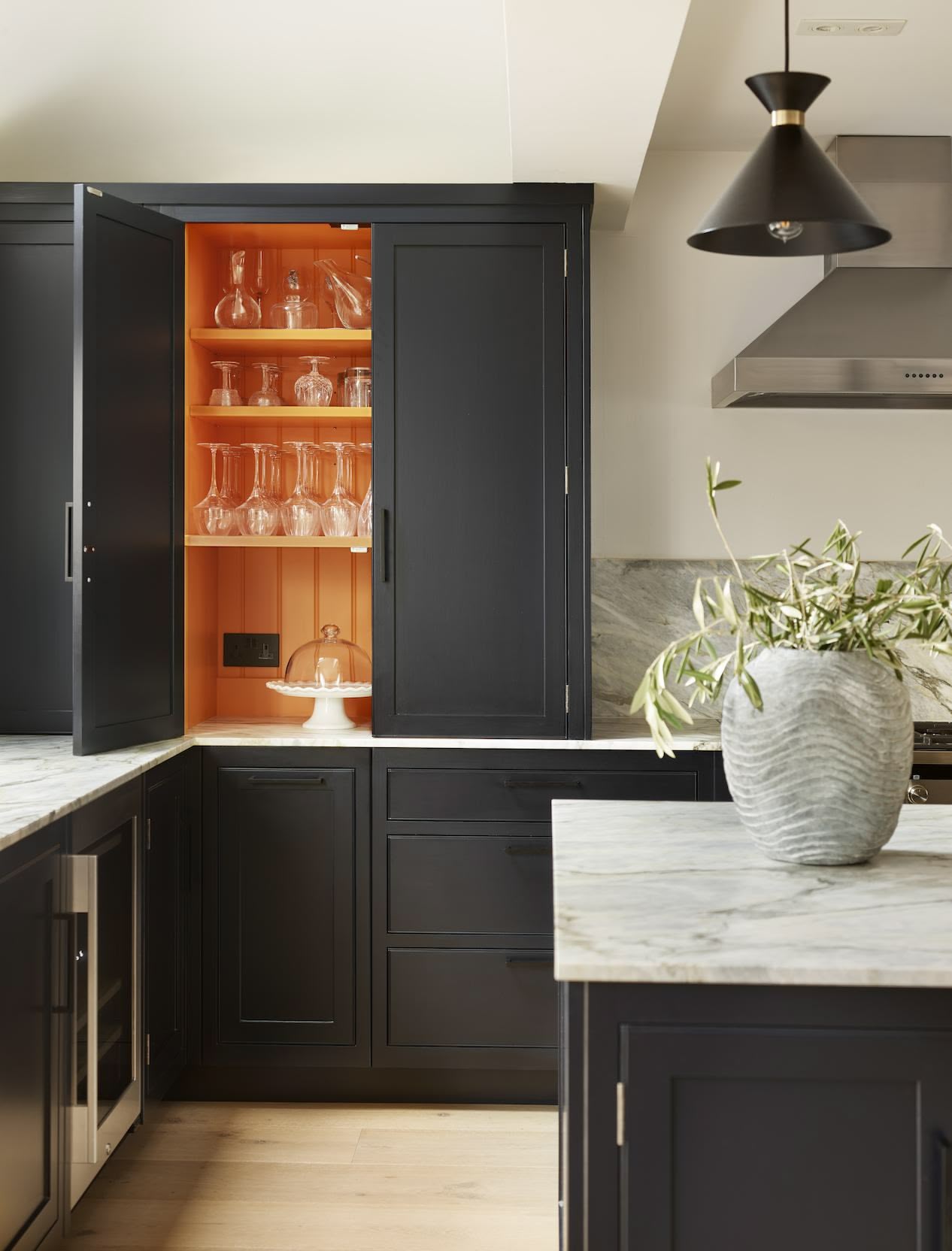 Harvey Jones black kitchen dresser open to show organised shelving