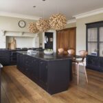 Black shaker kitchen cabinetry and worktops
