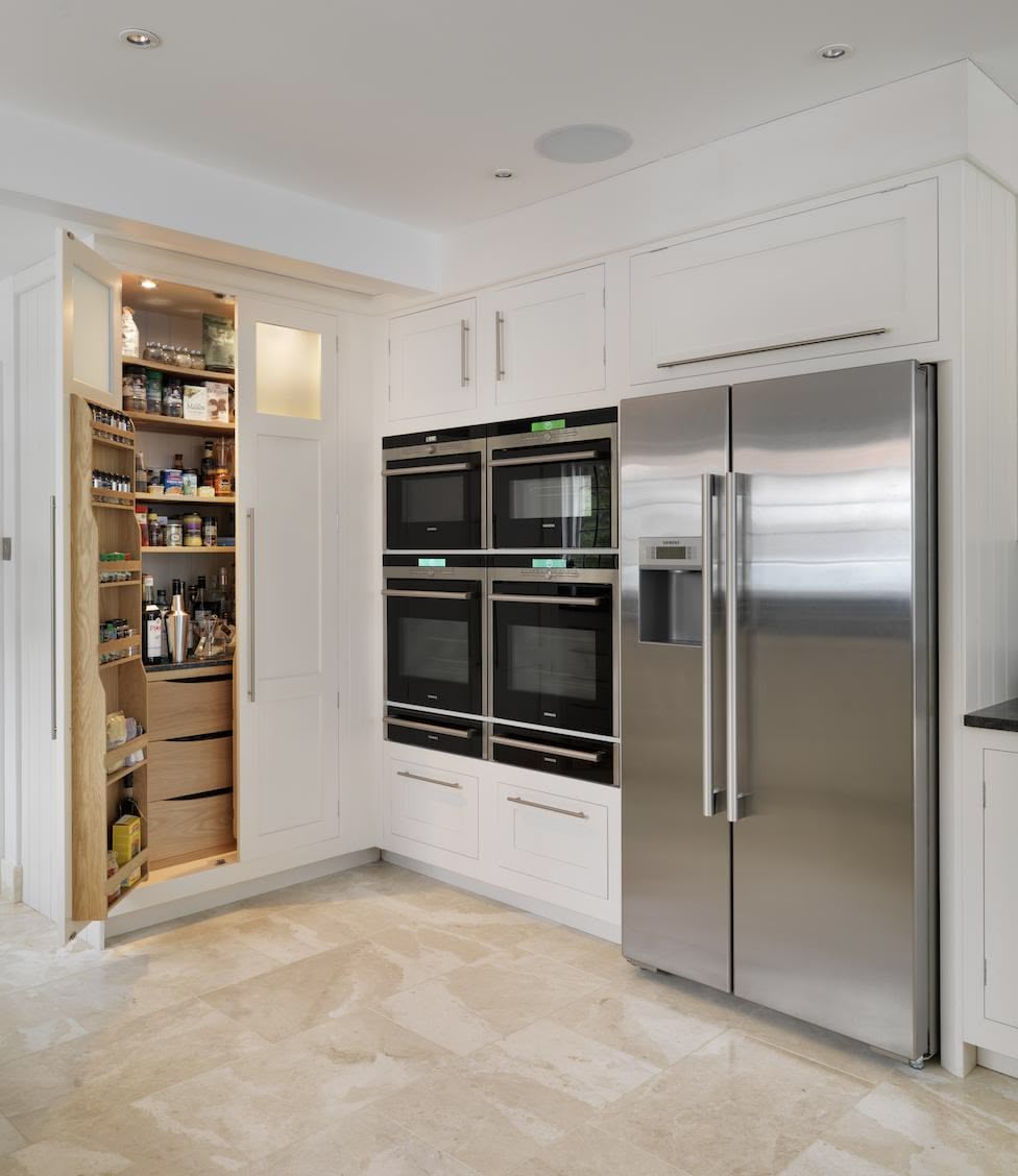 White open large pantry doors showing organised storage