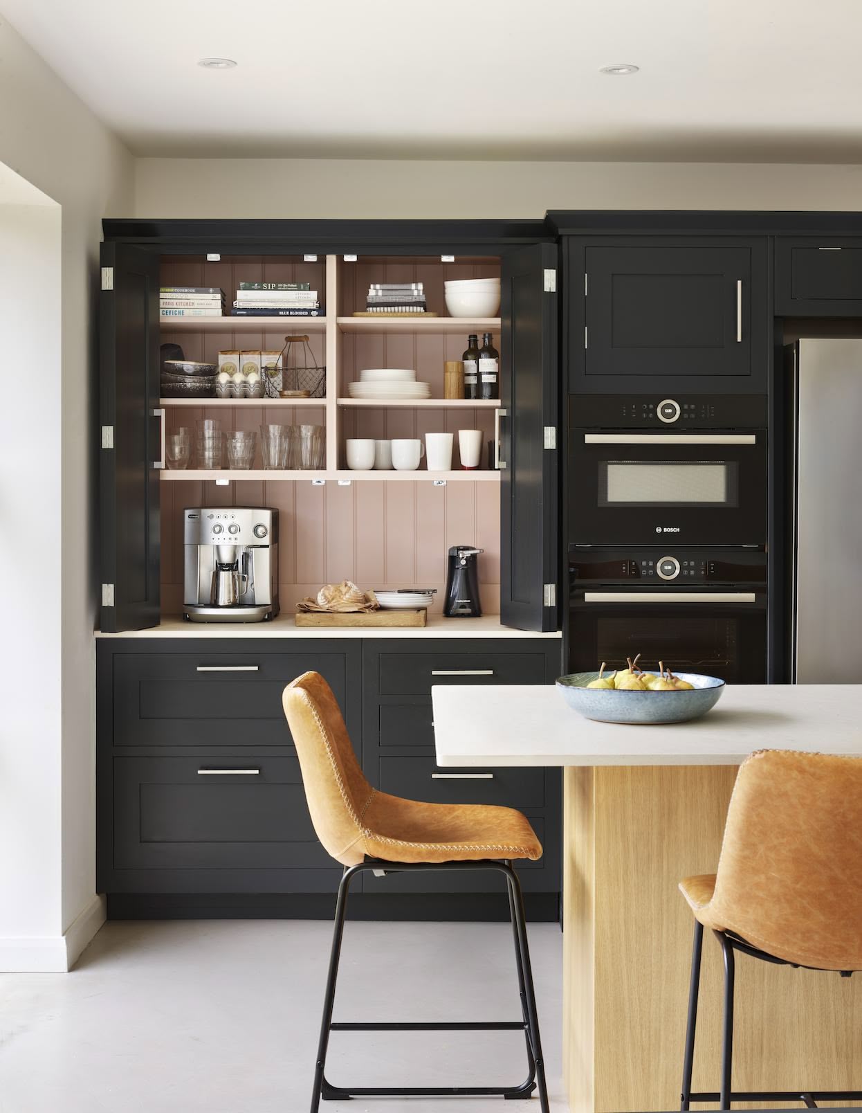 Harvey Jones black kitchen dresser open to show organised shelving