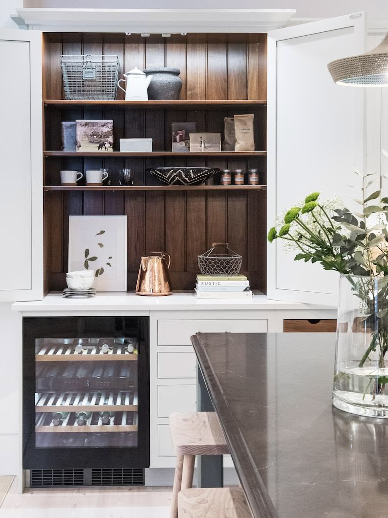Harvey Jones white kitchen dresser open to show organised shelving