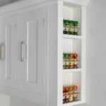 Open shelving kitchen cabinet end panel with organised storage