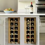 White kitchen island with light oak wine racks