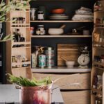 Wooden Pantry Cupboard with Dark Green Background