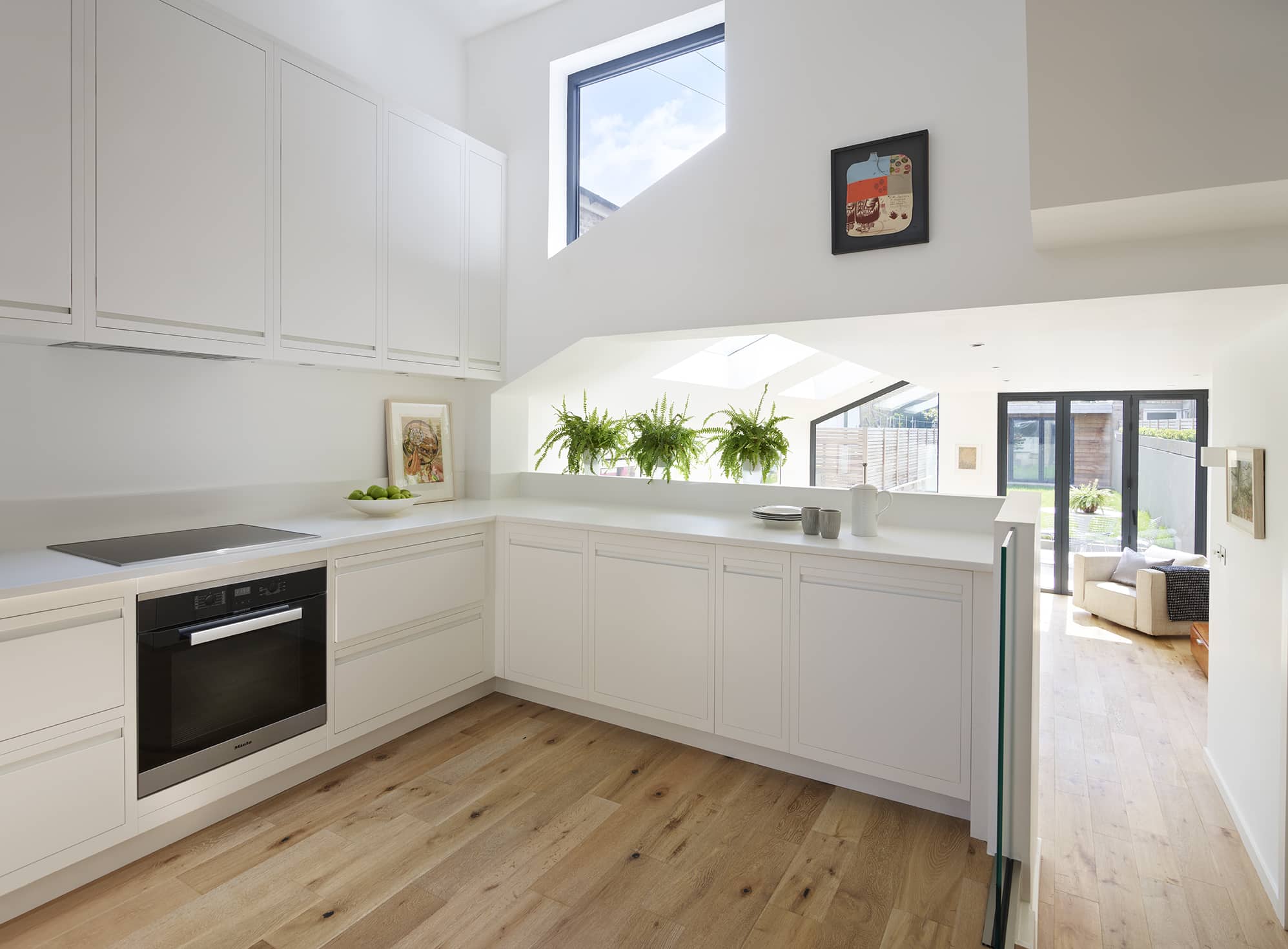 Open Plan White Linear Edge minimalist kitchen design