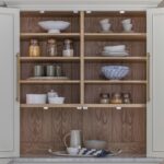 Harvey Jones white kitchen dresser open to show organised shelving