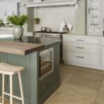 Green kitchen island with wine fridge