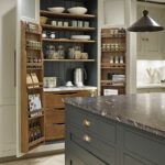 Open large pantry doors showing organised storage