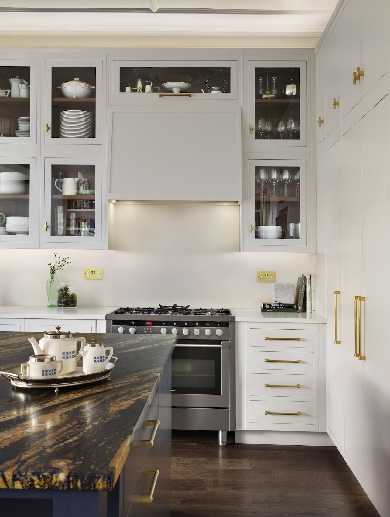 White Linear kitchen cabinetry with glass window doors
