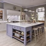 Blue kitchen island with white worktop and cream Original kitchen cabinetry