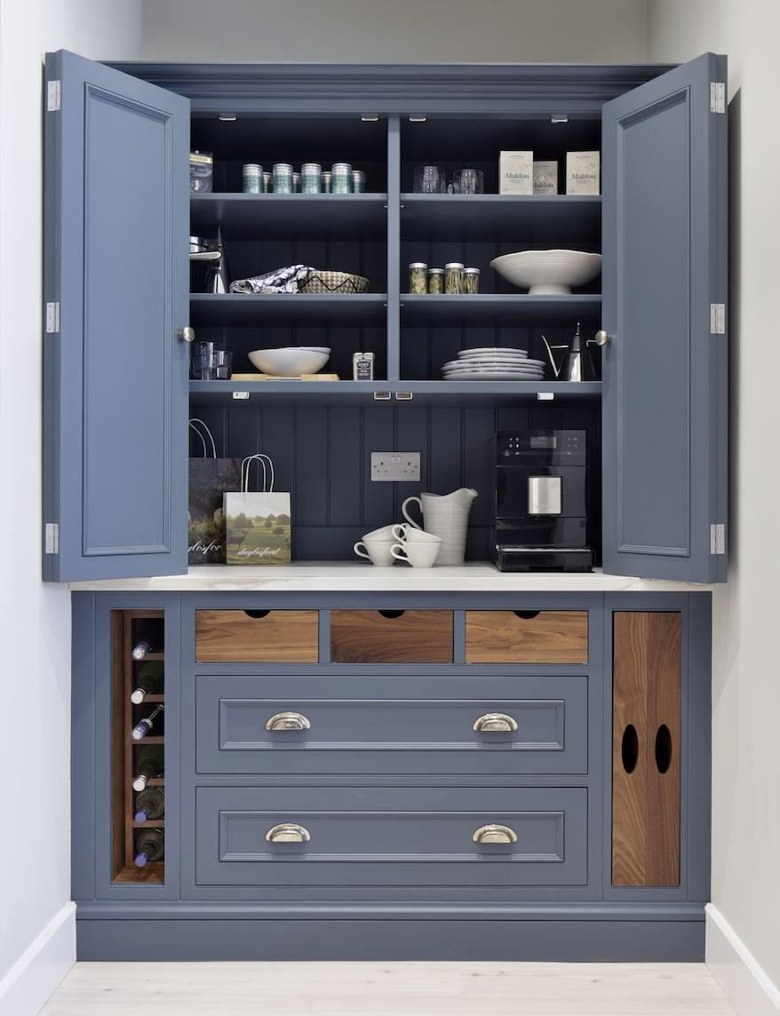 Harvey Jones blue kitchen dresser open to show organised shelving