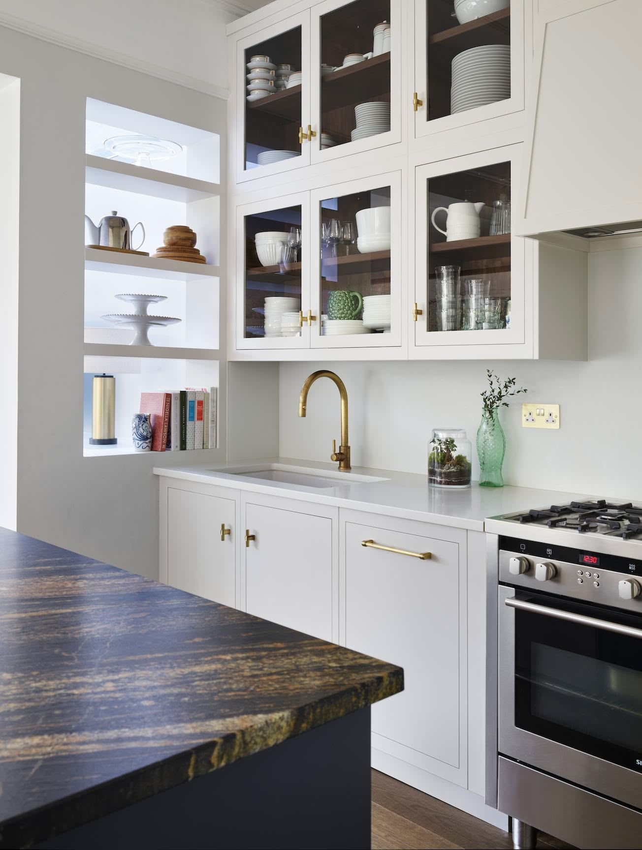 White Linear kitchen cabinetry with glass window doors