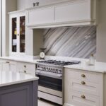 Cream Original kitchen cabinetry with white worktops