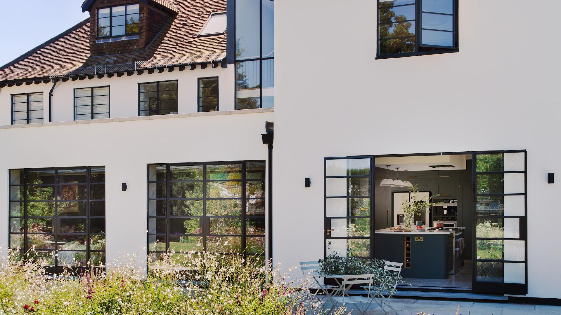 External view of kitchen seen through large glass sliding doors