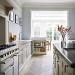 Off-white Original kitchen design and open plan dining room