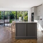 Smile stool against a grey kitchen island