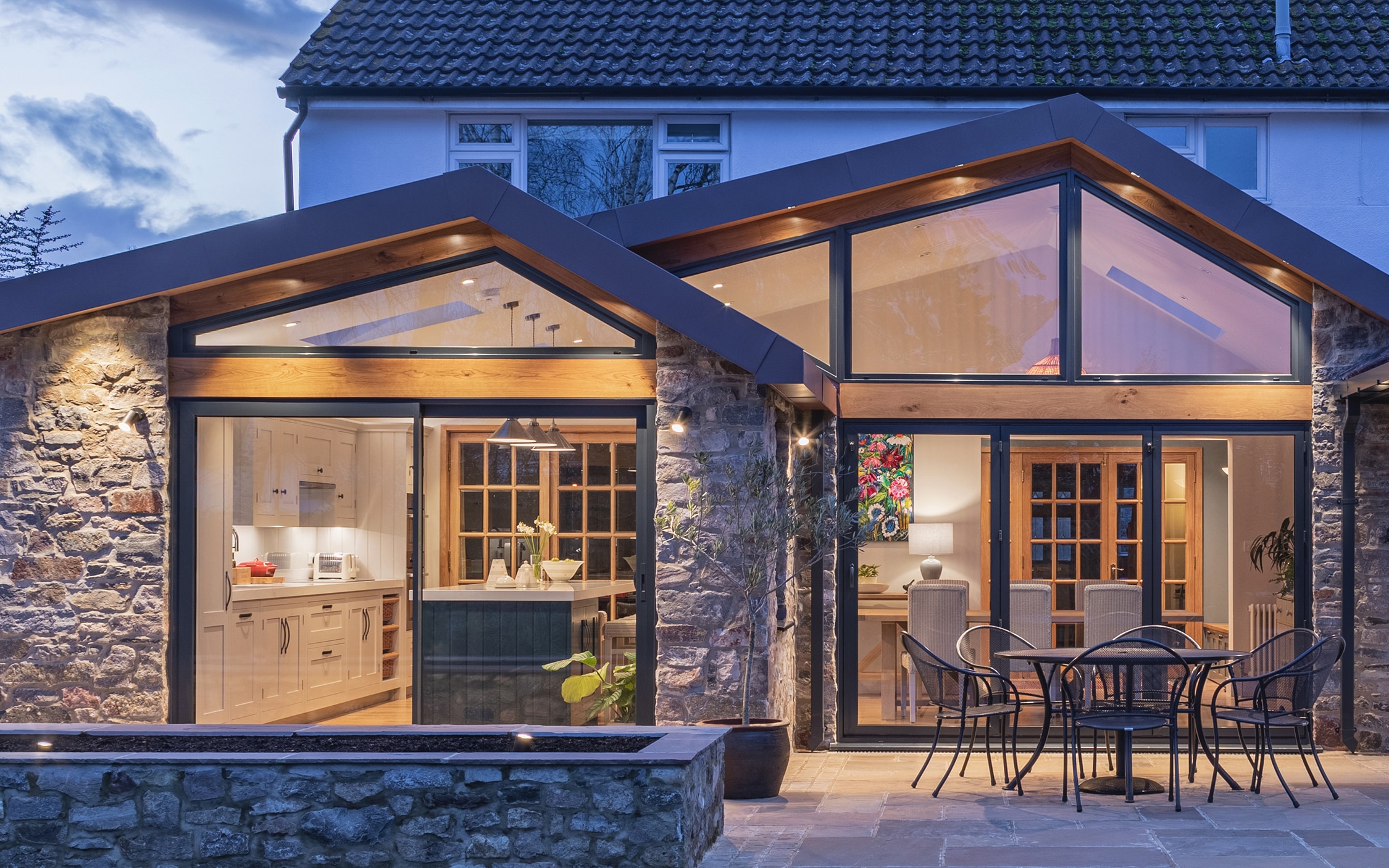 External view of extension featuring white Shaker kitchen design