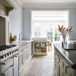 Kitchen design showing dining area featuring bench seating storage