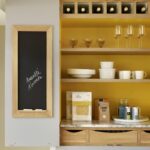 Harvey Jones white kitchen dresser open to show organised shelving